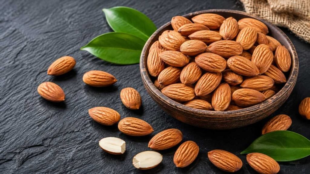 Scattered raw almonds rich in vitamin E and monounsaturated fats